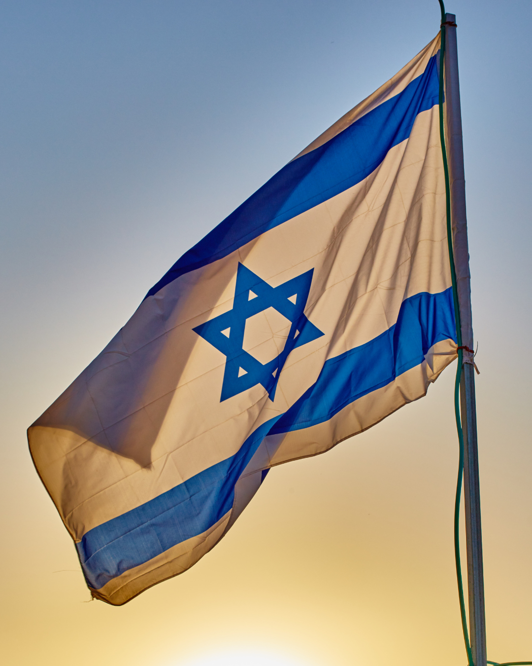 Israel flag at sunrise